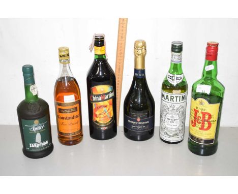 Six bottles of various Martini and other spirits and sparkling wine