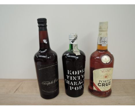 Three bottles of Port, Kopke Vintage Character Port 20% vol, 70cl, Triple Crown Port, no strength or capacity stated and Port