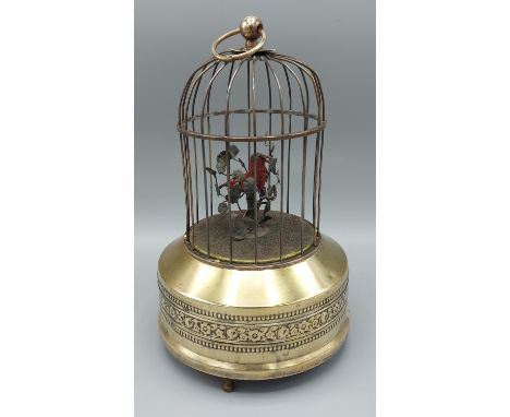 An musical automaton bird cage with singing bird, 23cms tall