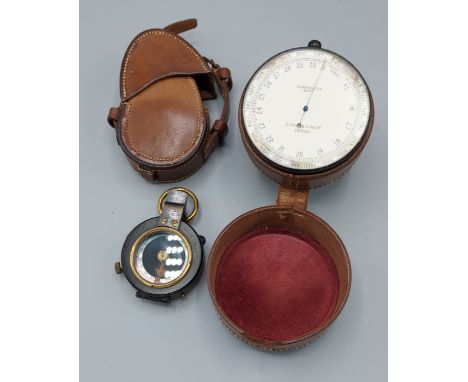 A WWI Verners Pattern compass by F. Barker and Son London within leather case together with a Compensated barometer by S. Smi