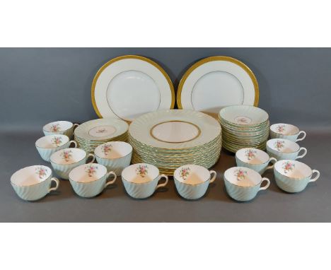 A Minton twelve place setting tea service together with two Minton dinner plates 