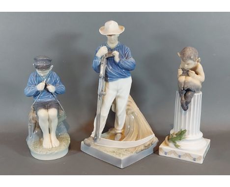 A Royal Copenhagen porcelain model of a man with scythe together with another similar model of a Faun on a column and another