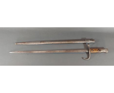 A WWI Turkish bayonet with metal scabbard, 52cm blade 