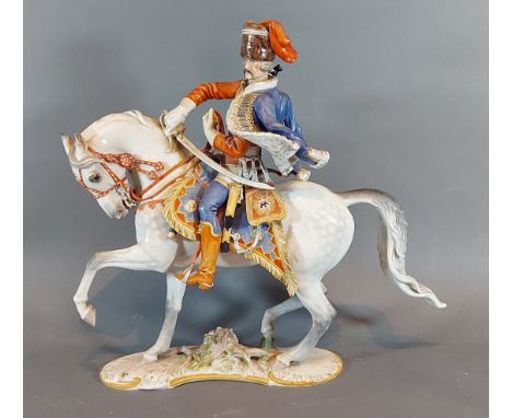 Professor Theodor Karner, a Rosenthal porcelain model of of a military horse and rider, 32cms tall 