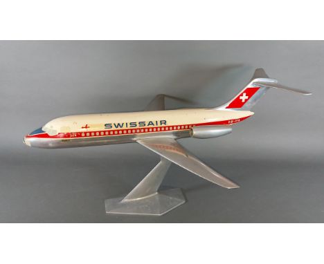 A Circa 1970's metal model of a Swiss air DC-9 aeroplane, 64cms long 