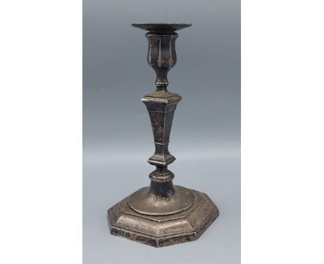 A George V silver candlestick in the 18th Century style, Sheffield 1913, 22cms tall 