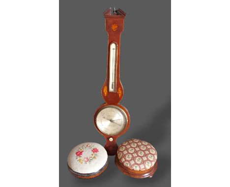 A 19th Century wheel barometer, thermometer together with two circular footstools 