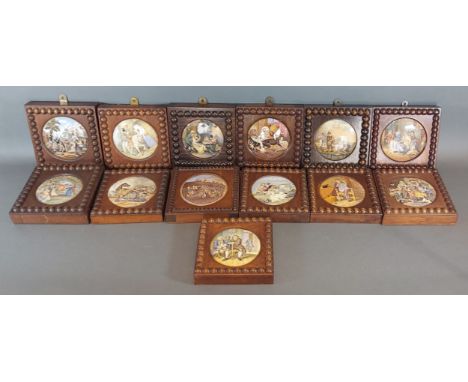 A Prattware Pot lid The Cavalier together with twelve other Prattware pot lids, all mounted within oak frames 