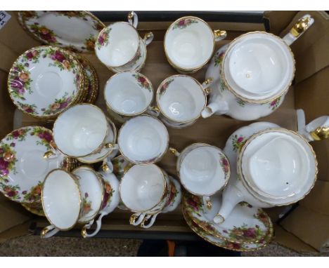 Royal Albert tea ware in the Old Country Roses pattern including two large teapots, 14 tea cups, 4 breakfast tea cups, 12 sau