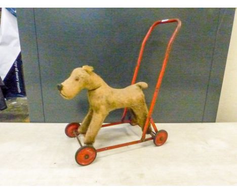 Vintage children's push along toy, height 50cm.