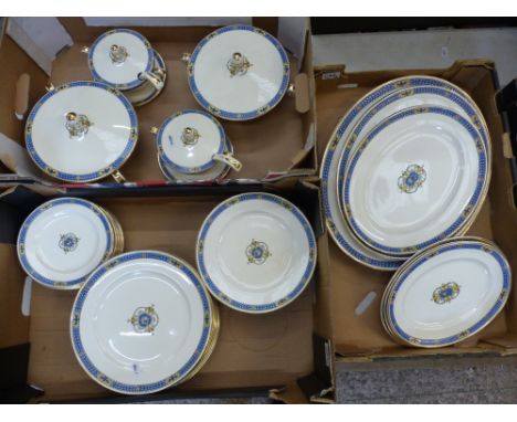 An extensive suite of Royal Worcester dinner ware in the Lichfield pattern, 12 place settings consisting of dinner, salad and
