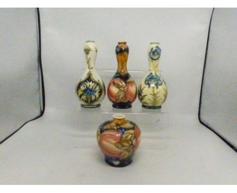 Four ceramic vases in the manner of Old Tupton Ware, no backstamps, tallest 18cm (4).
