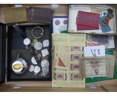 A mixed collection of items to include coins, vintage driving licenses, set of 'Gestes Frivoles' erotic postcards, fuel ratio
