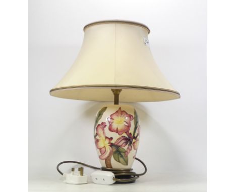 Moorcroft, Table lamp in the Frangipani design. Includes original moorcroft lamp shade. Height to top of fitting: 28cm