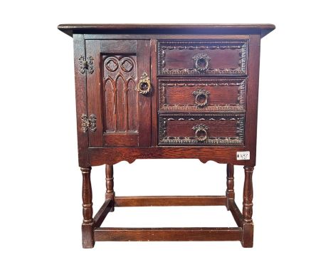 Oak Lamp Table. Bracket base with 3 drawers and left hand cupboard. H68cm
