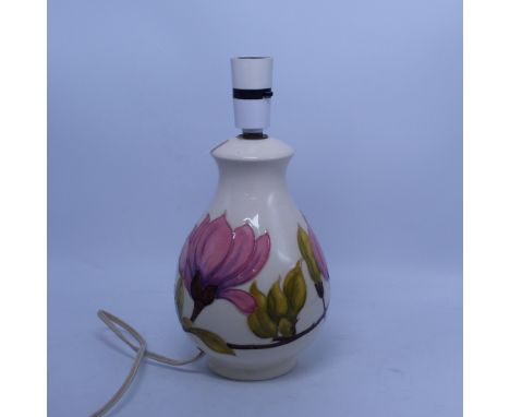 Moorcroft table lamp in the Pink Magnolia pattern, height of ceramic base 20.5cm.