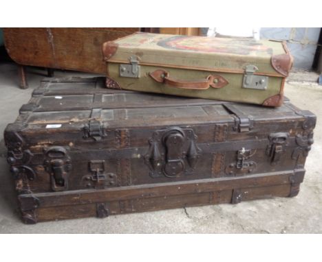 Old steamer trunk and a naval ratings canvas suitcase, decorated