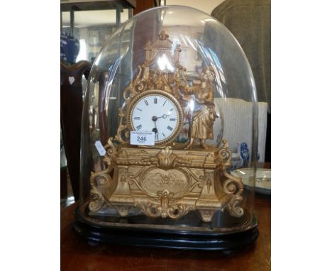 19th c. French gilt mantle clock, under dome, surmounted by figure of a girl directing a play with model theatre, 41cm tall
