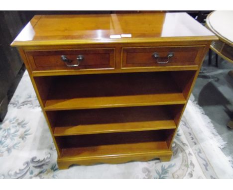 Modern yew wood veneer chest of two short drawers, with open shelves below, on bracket feet, width 76cm 