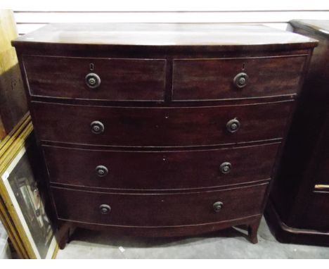 Georgian mahogany bowfront chest of drawers with two short and three long graduated drawers, raised on swept bracket feet, wi