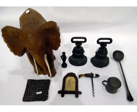 Carved wooden elephant with bone tusks, a pair of doorstops and various trinket boxes and other items 