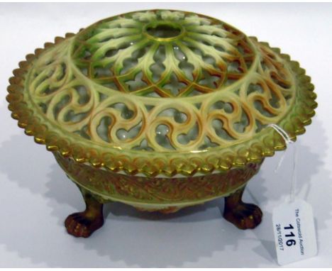 Royal Worcester tinted bisque porcelain pot-pourri bowl and pierced cover, No.846, circular and raised on three paw feet, the