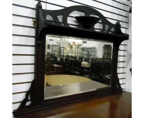 Late Victorian mahogany-framed rectangular wall mirror with bevelled plate, open fretwork back, with a shelf, width 112cm 