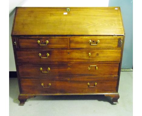 Georgian mahogany bureau, the fall revealing fitted interior, over two short and three graduated long drawers, with brass squ