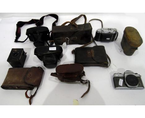 Quantity of cameras and camera equipment to include binoculars, Pentax ME Super camera in case, a Franka camera and other ite