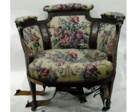 Edwardian marquetry inlaid mahogany and upholstered tub chair raised on square tapering supports, spade feet and on castors, 