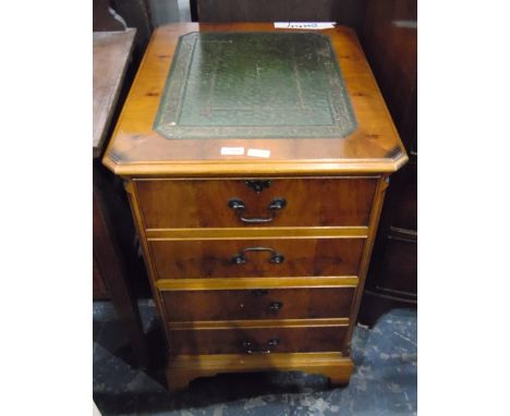 Walnut veneer filing cabinet, the top with inset writing surface, two deep drawers below faced as four, on bracket feet, widt