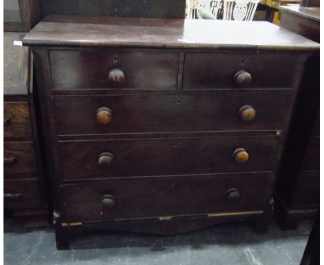 19th century mahogany chest of drawers, with two short and three long graduated drawers, turned wooden handles, reeded flanks