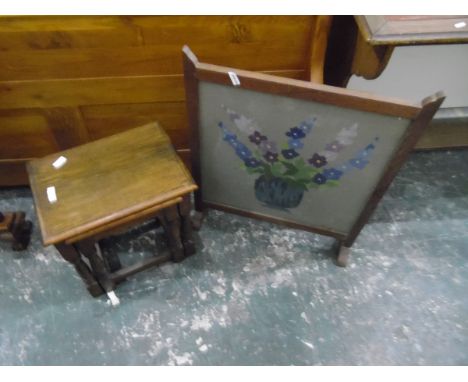 Nest of two oak stools and a fire screen with woolwork panel (3) 