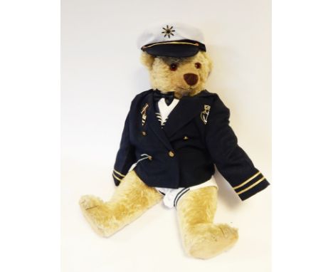 Large Chad Valley bear dressed in a captain's uniform, 63cm long 