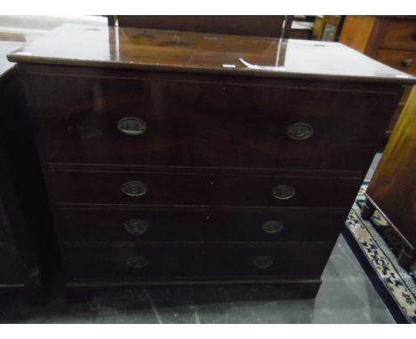 19th century mahogany chest, the rising top revealing storage compartment with dummy drawer front, three long graduated drawe