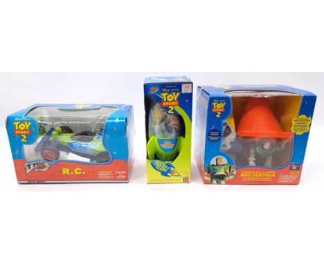 Mattel, Thinkway Toy Story 2 trio including: Toy Story 2 Buzz Lightyear of Star Command Rocket of Aliens, Undercover / Agent 