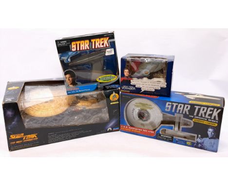 Star Trek Group including: (1) Diamond Select Toys Star Trek Phaser; (2) Wesco Star Trek Voyager alarm clock; (3) Diamond Sel