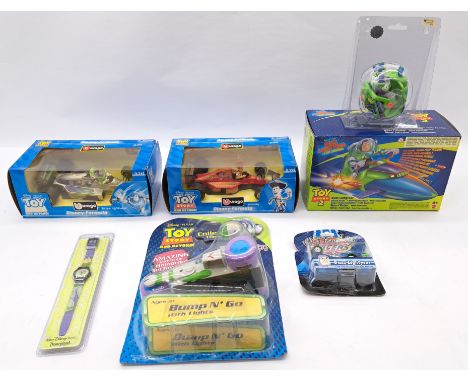 Mattel, Burago Disney Toy Story group including: Disney Formula Woody 1/24, Disney Formula Buzz Lightyear 1/24, Disney World 