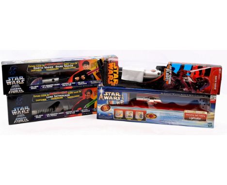 Star Wars Lightsaber group including: (1) Hasbro Anakin Skywalker interactive lightsaber; (2) Kenner Luke Skywalker lightsabe