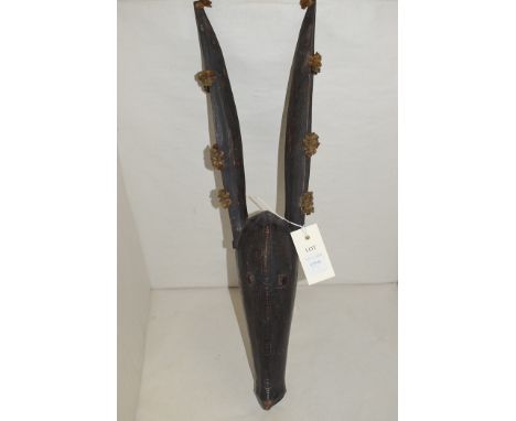 A West African elongated dog puppet mask, possibly from Mali, 52cms.