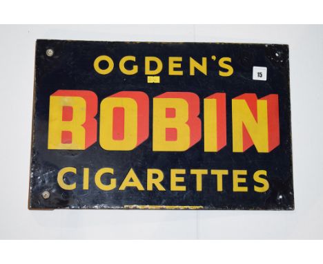 'Ogdens Bobbin Cigarettes' enamel advertising sign, with wooden bracket, 46 x 30cms.