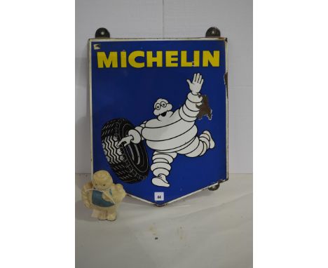 Michelin enamel advertising sign, by R.C. Claremont, France, 38 x 48cms; together with a "Michelin Man" plastic squeaky adver