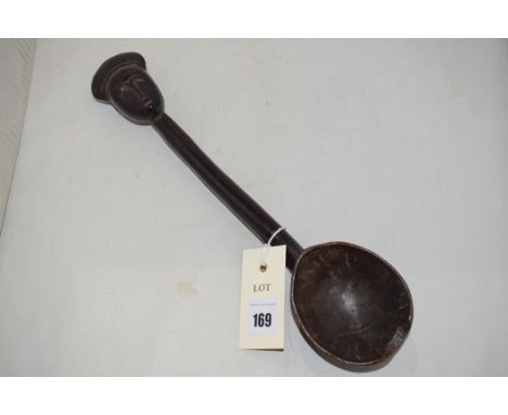 A West African baule spoon, with carved head finial, 31cms.