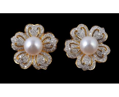  A pair of cultured pearl and diamond flower head earrings,   the central cultured pearl within a surround of brilliant cut d