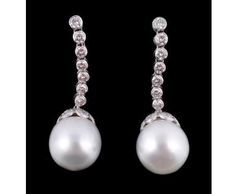  A pair of South Sea cultured pearl and diamond earrings,   the 1.3cm South Sea cultured pearls suspended below brilliant cut