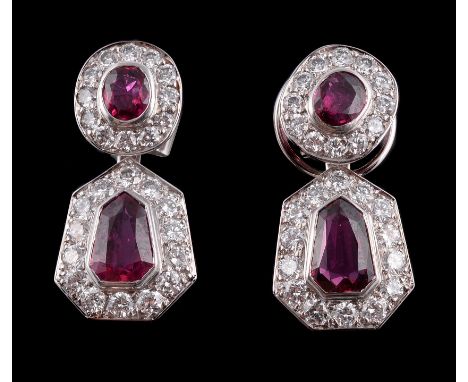  A pair of ruby and diamond ear pendants  , the surmounts with an oval cut ruby within a surround of brilliant cut diamonds, 