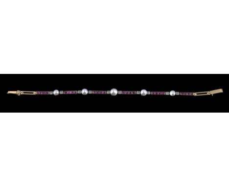  An early 20th century pearl, ruby and diamond bracelet,   the articulated bracelet composed of rectangular panels channel se