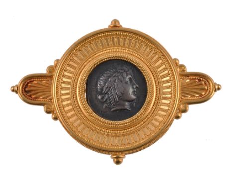  A 19th century Greek coin brooch by Castellani,   circa 1860, the silver Lycian League coin within a gold setting with ropet