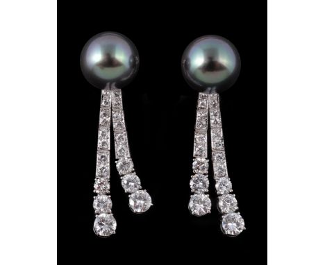  A pair of Tahitian cultured pearl and diamond earrings,   the 1.1cm Tahitian cultured pearls set above two rows of graduated