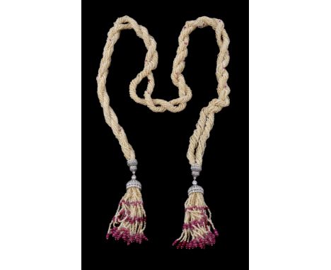  A seed pearl, diamond and ruby sautoir,   the multi strand seed pearl ropetwist necklace with ruby bead accents  to two frin